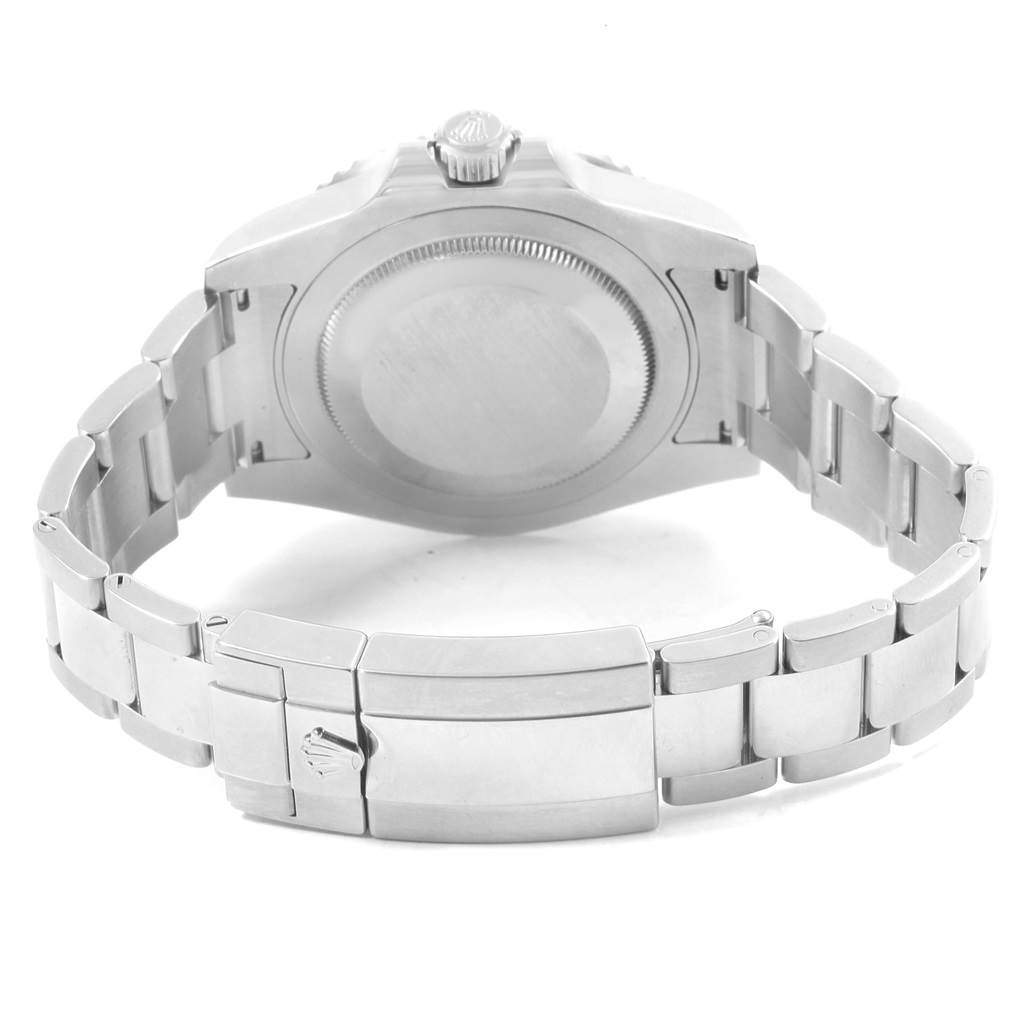 The image shows the rear angle of a Rolex GMT-Master 116710 Men's Stainless Steel Black Dial 116710 Men's Stainless Steel Black Dial watch focusing on its stainless steel case back and bracelet with clasp.