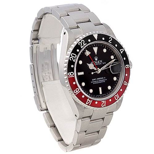This image shows a side angle of a Rolex GMT-Master 16710 Men's Stainless Steel Black Dial 16710 Men's Stainless Steel Black Dial watch, highlighting its bezel, dial, case, and bracelet.