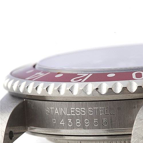 This close-up image shows the case side and partial bezel of a Rolex GMT-Master 16710 Men's Stainless Steel Black Dial 16710 Men's Stainless Steel Black Dial watch, highlighting the stainless steel material and serial number.