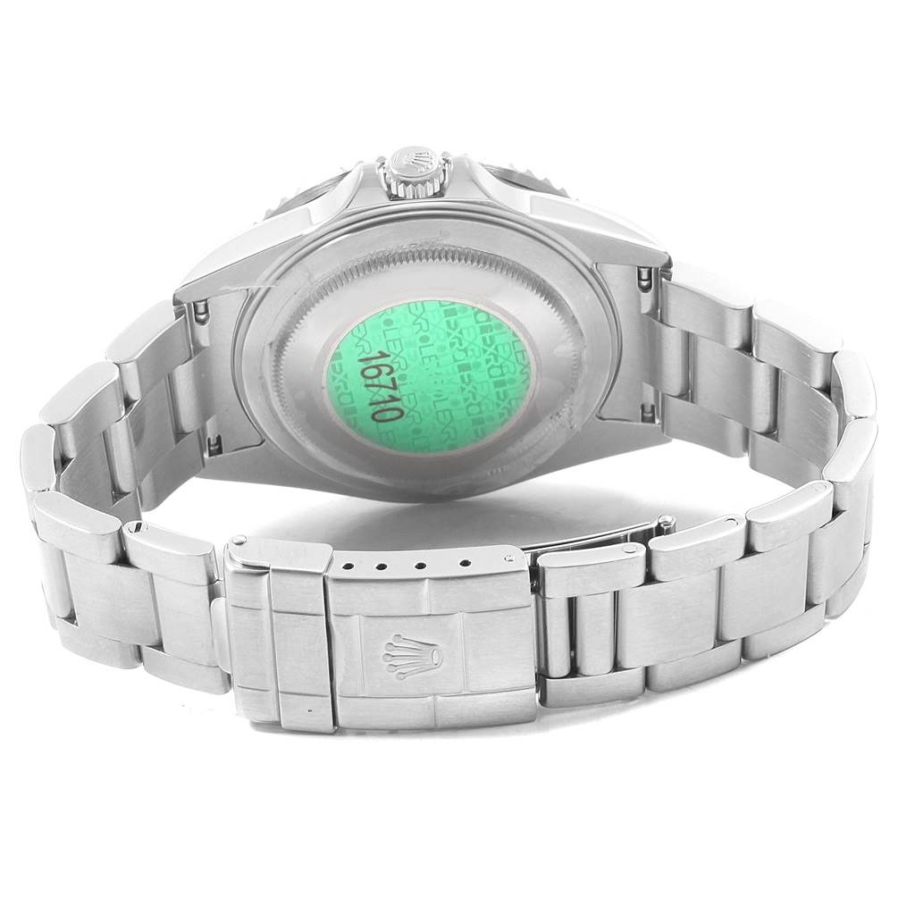 The image shows the back view of a Rolex GMT-Master 16710 Men
s Stainless Steel Black Dial 16710 Men
s Stainless Steel Black Dial watch, highlighting the case back, crown, and bracelet with the clasp.