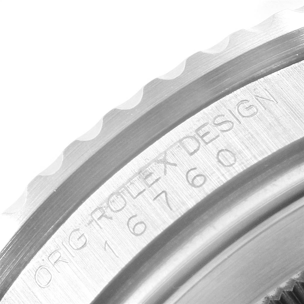 This close-up image shows the engraved model number on the side of the bezel of a Rolex GMT-Master 16760 Men's Stainless Steel Black Dial 16760 Men's Stainless Steel Black Dial watch.