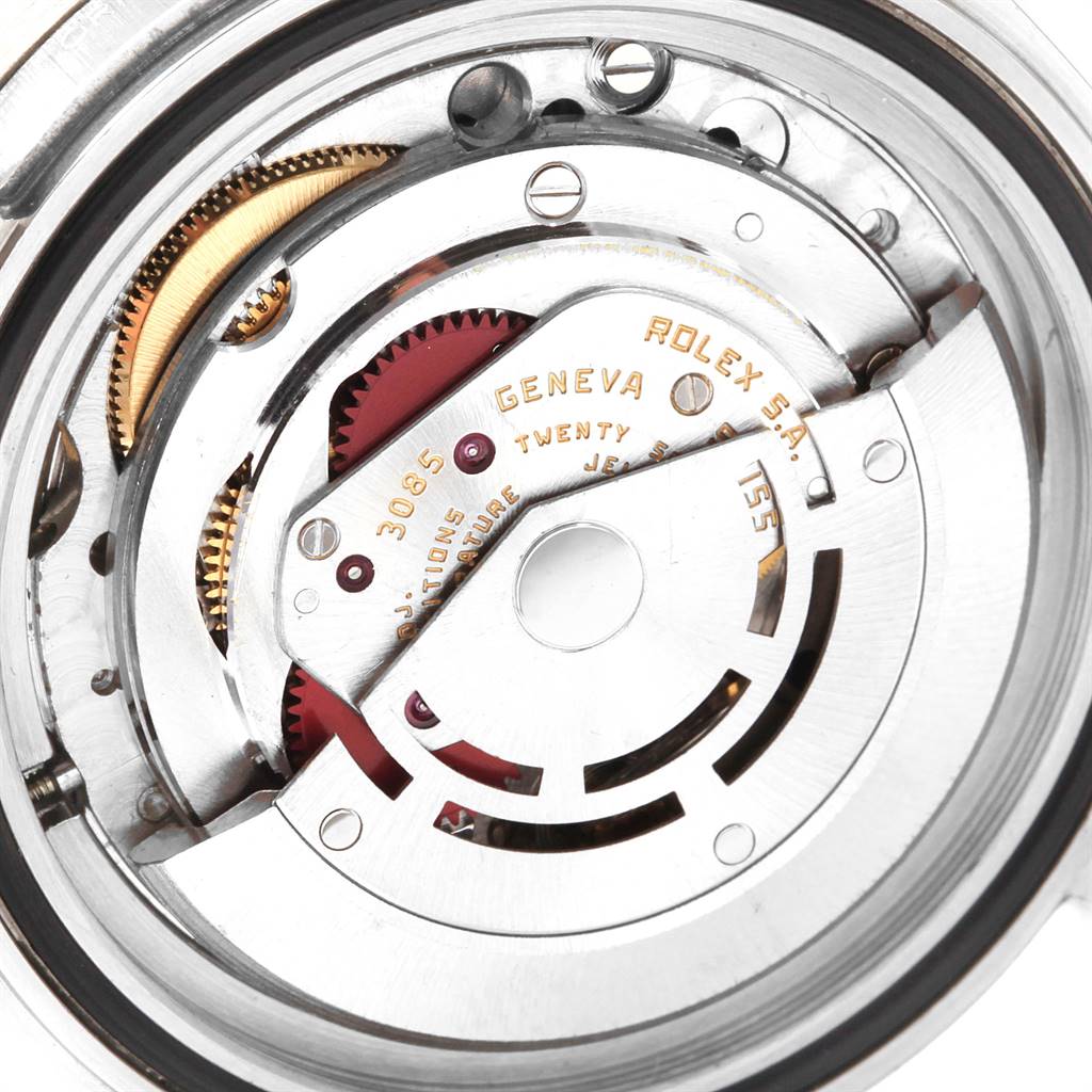 This is a close-up view of the inner mechanics, specifically the movement, of the Rolex GMT-Master 16760 Men's Stainless Steel Black Dial 16760 Men's Stainless Steel Black Dial watch.