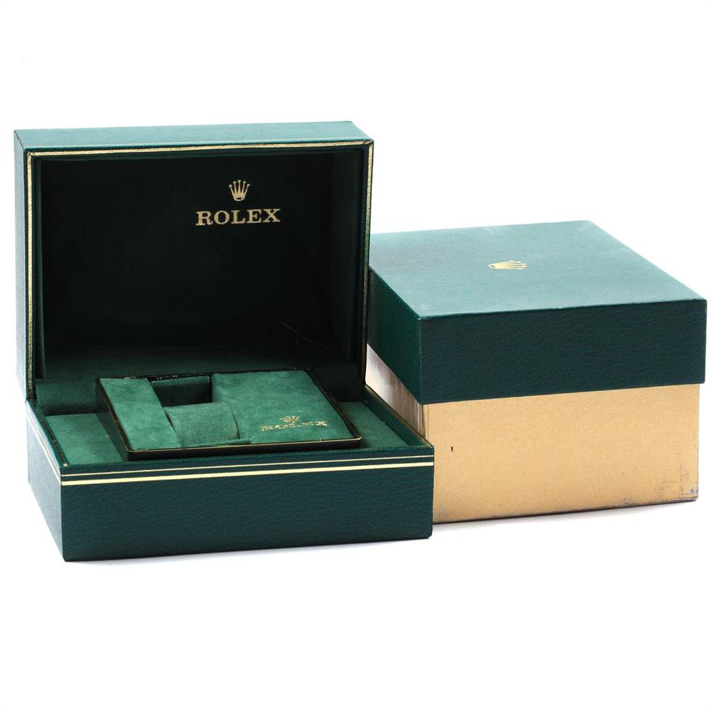 The image shows an open green Rolex box with the GMT-Master model, and a closed outer box beside it.