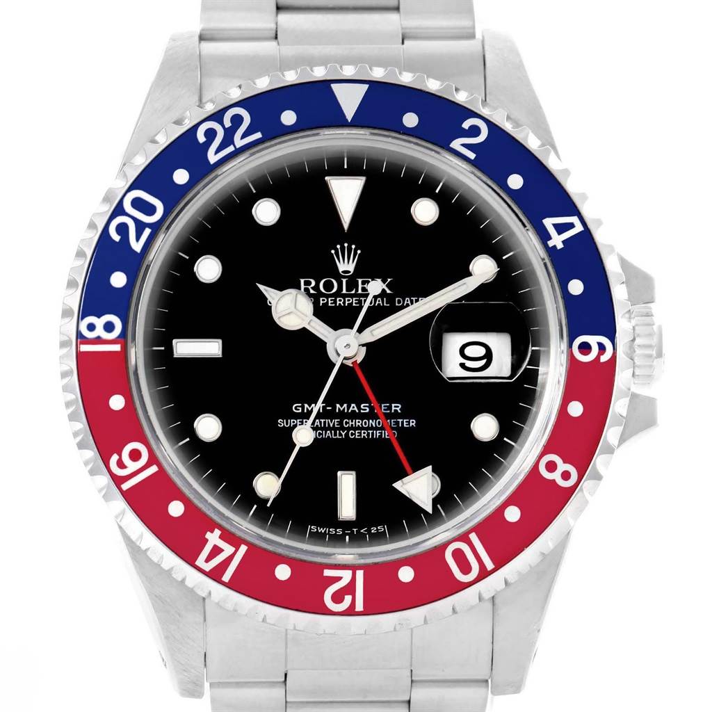 The image displays a frontal close-up view of a Rolex GMT-Master 16700 Men's Stainless Steel Black Dial 16700 Men's Stainless Steel Black Dial watch, highlighting its bezel, dial, and date window.