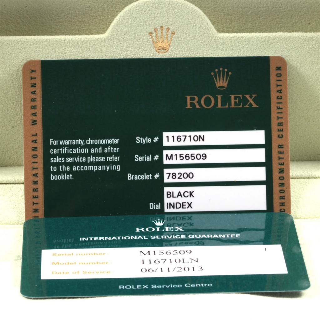This image shows the warranty and service guarantee cards for a Rolex GMT-Master 116710 Men's Stainless Steel Black Dial 116710 Men's Stainless Steel Black Dial model watch.