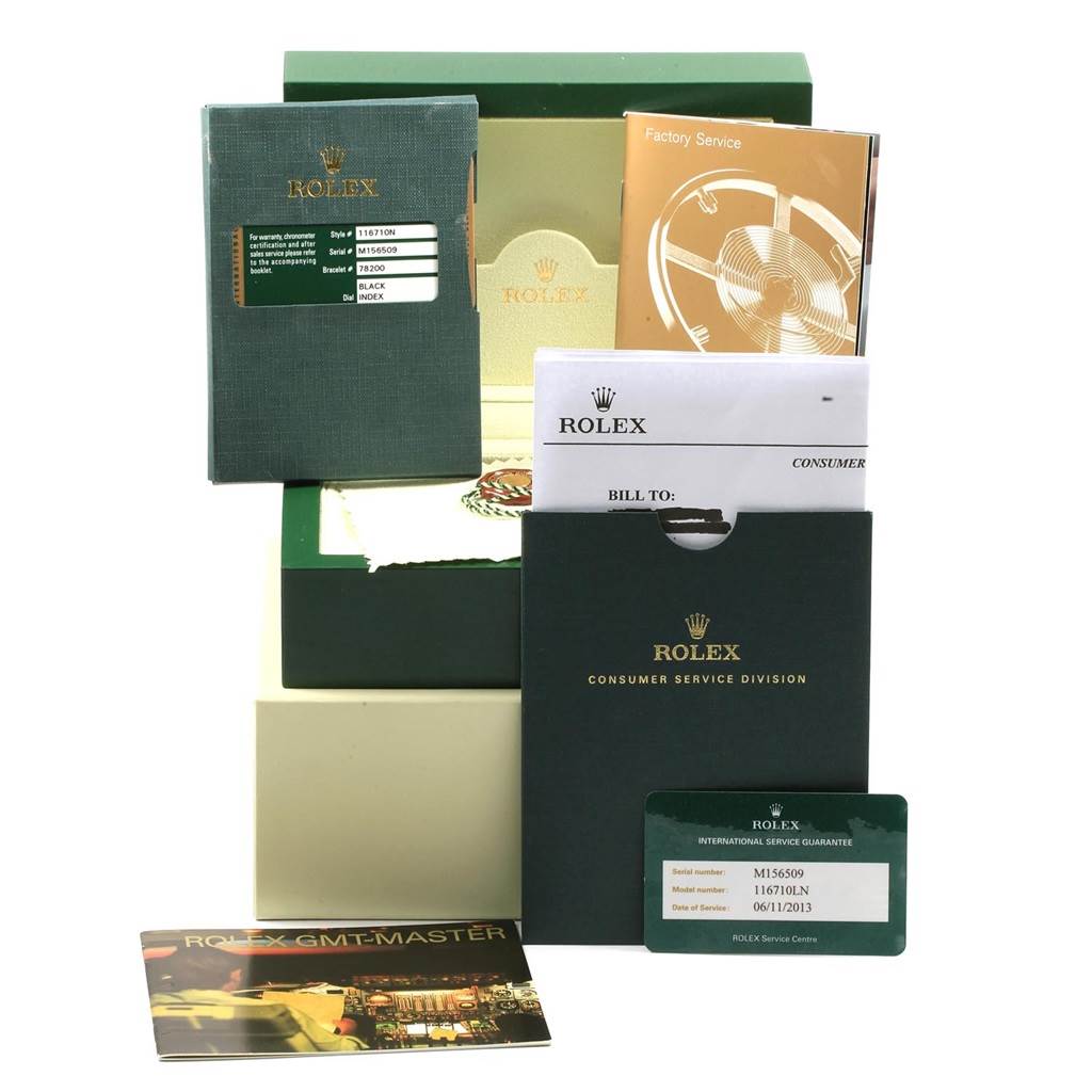 The image displays manuals, booklets, warranty cards, and paperwork for the Rolex GMT-Master 116710 Men's Stainless Steel Black Dial 116710 Men's Stainless Steel Black Dial watch from a front angle.