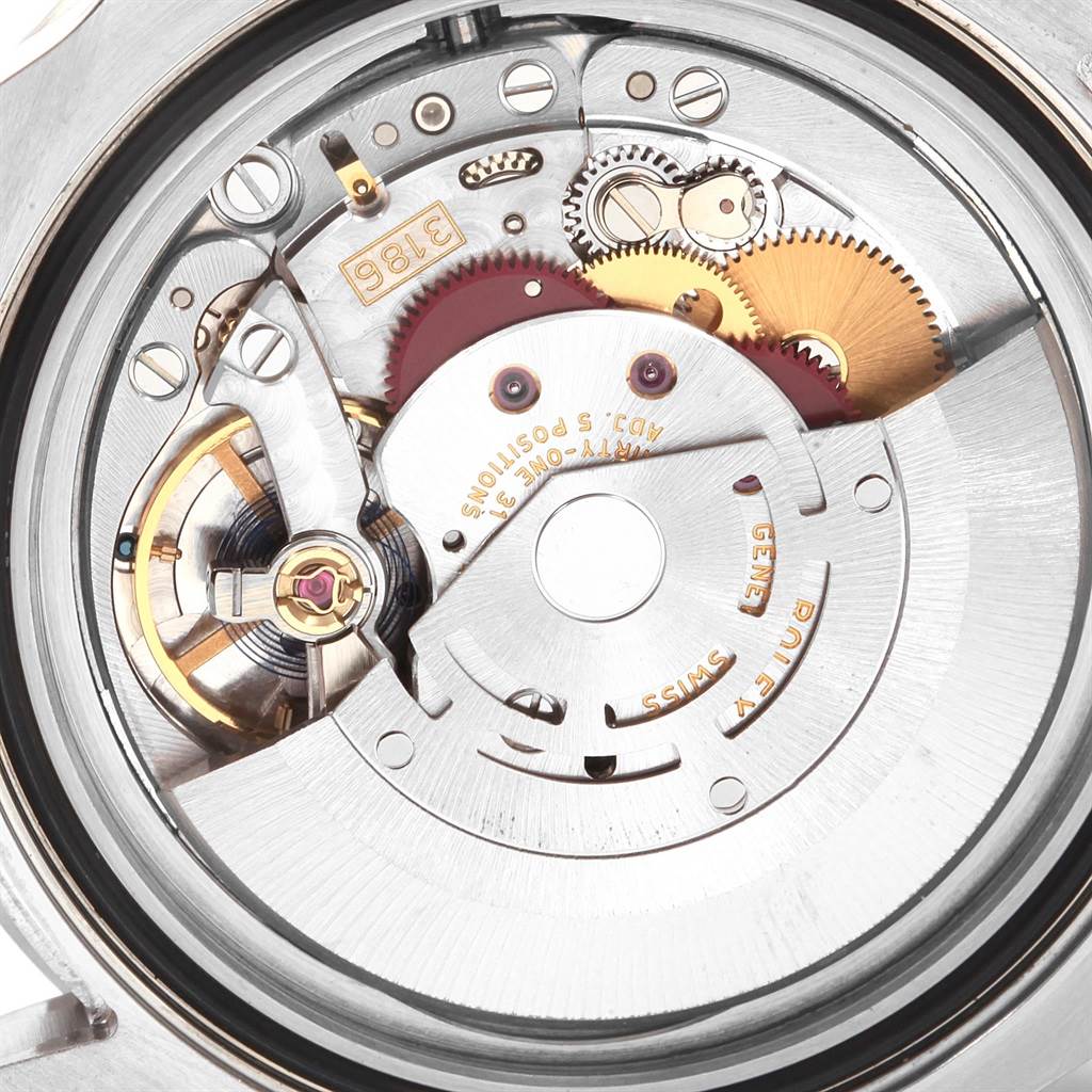 This image shows a close-up of the internal movement components of a Rolex GMT-Master 116710 Men's Stainless Steel Black Dial 116710 Men's Stainless Steel Black Dial watch.
