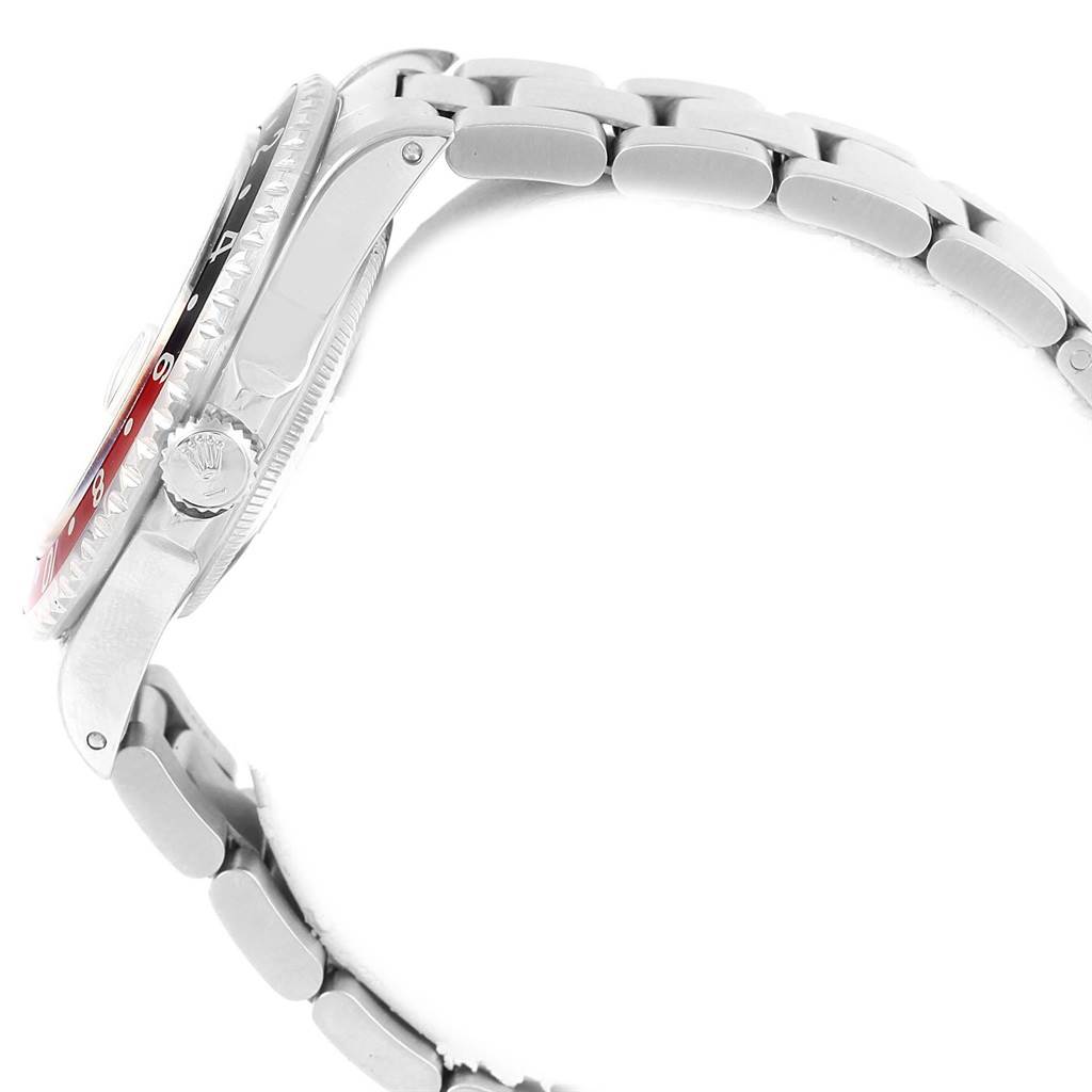 The image shows a side profile of a Rolex GMT-Master 16700 Men's Stainless Steel Black Dial 16700 Men's Stainless Steel Black Dial watch, emphasizing the case, bezel, crown, and bracelet links.