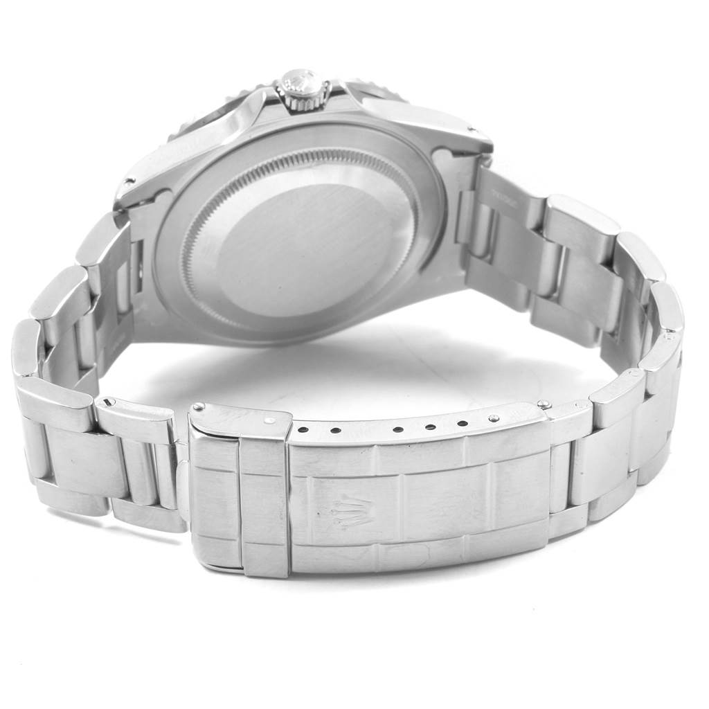 The image shows the back case and bracelet clasp of a Rolex GMT-Master 16700 Men's Stainless Steel Black Dial 16700 Men's Stainless Steel Black Dial watch.