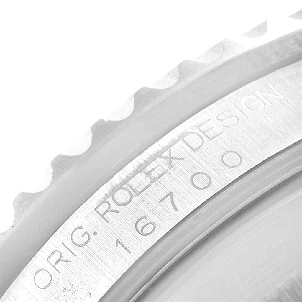 Close-up angle of the case side and partially visible bezel of a Rolex GMT-Master 16700 Men's Stainless Steel Black Dial 16700 Men's Stainless Steel Black Dial, showing the engraved model number 16700.