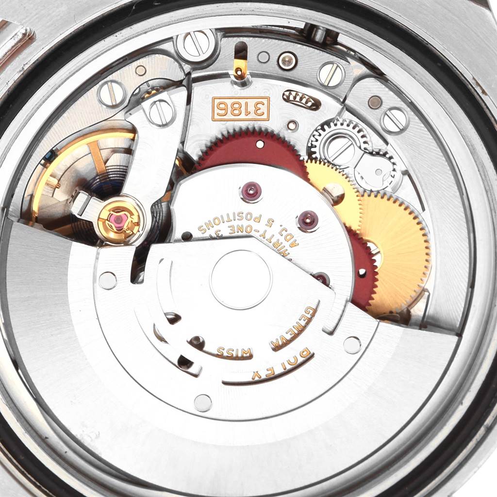 This image shows the movement mechanism of a Rolex GMT-Master 116710 Men's Stainless Steel Black Dial 116710 Men's Stainless Steel Black Dial watch, highlighting gears and components from the back.
