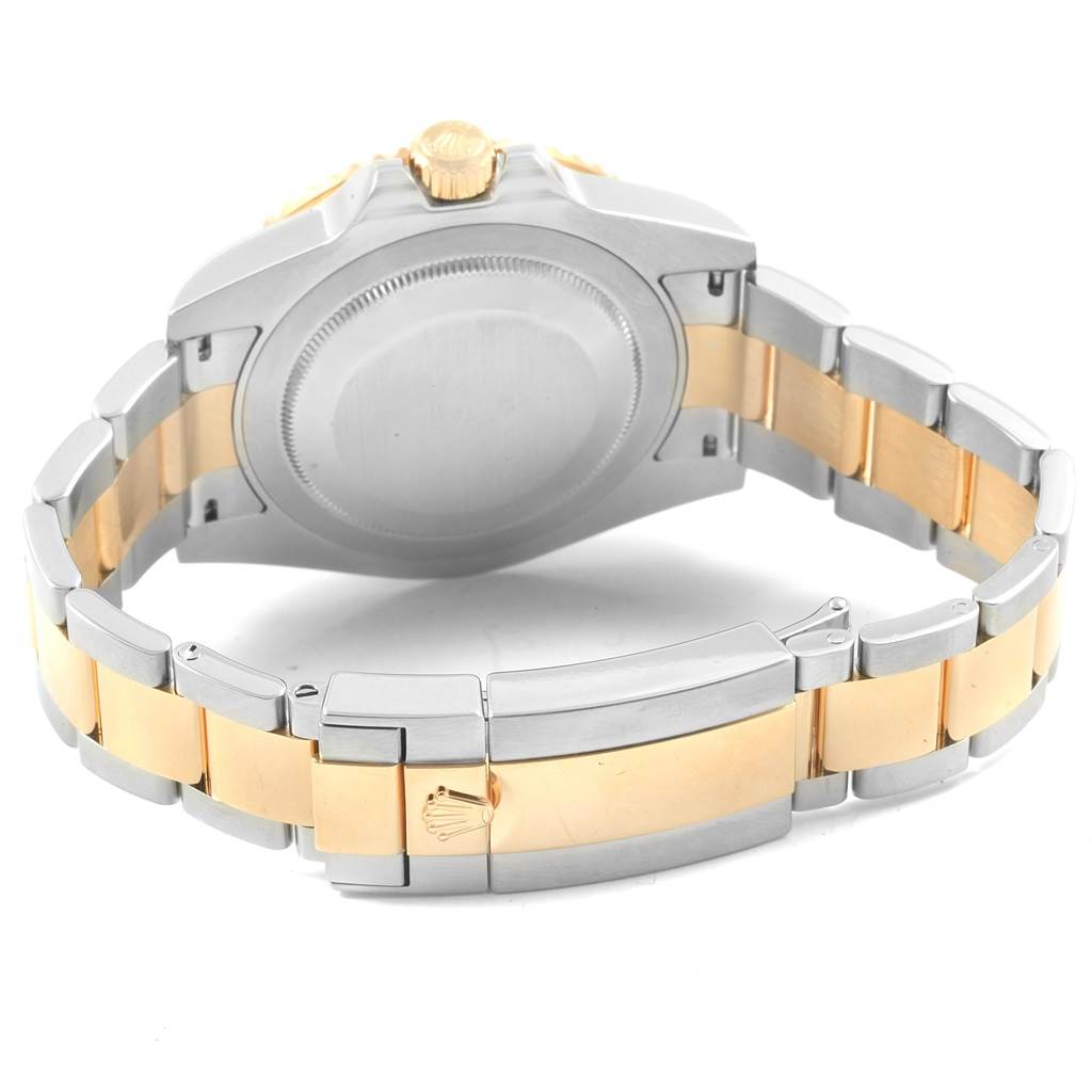 The image shows the back case and clasp of a Rolex GMT-Master 116713 Men
s Stainless Steel Black Dial 116713 Men
s Stainless Steel Black Dial watch, highlighting the two-tone bracelet.