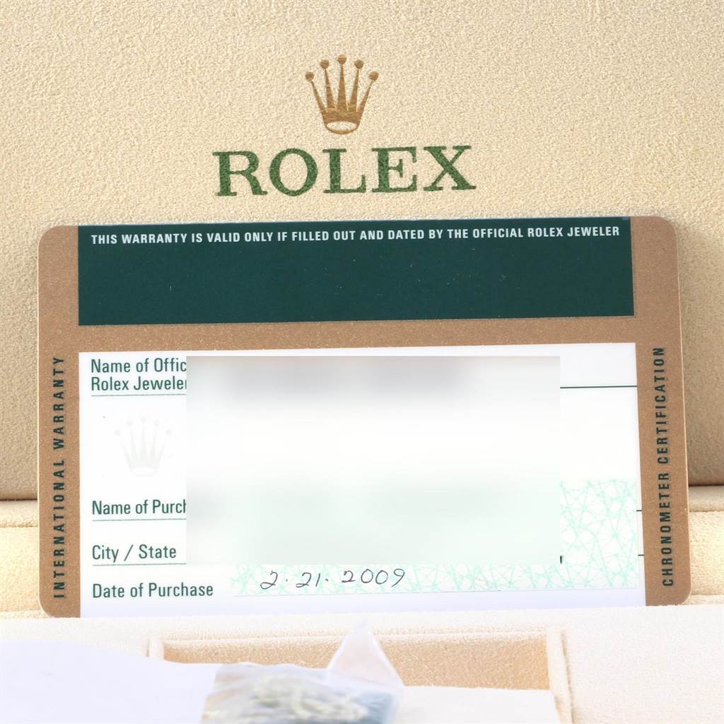 The image shows the warranty card for a Rolex GMT-Master 116713 Men
s Stainless Steel Black Dial 116713 Men
s Stainless Steel Black Dial watch.