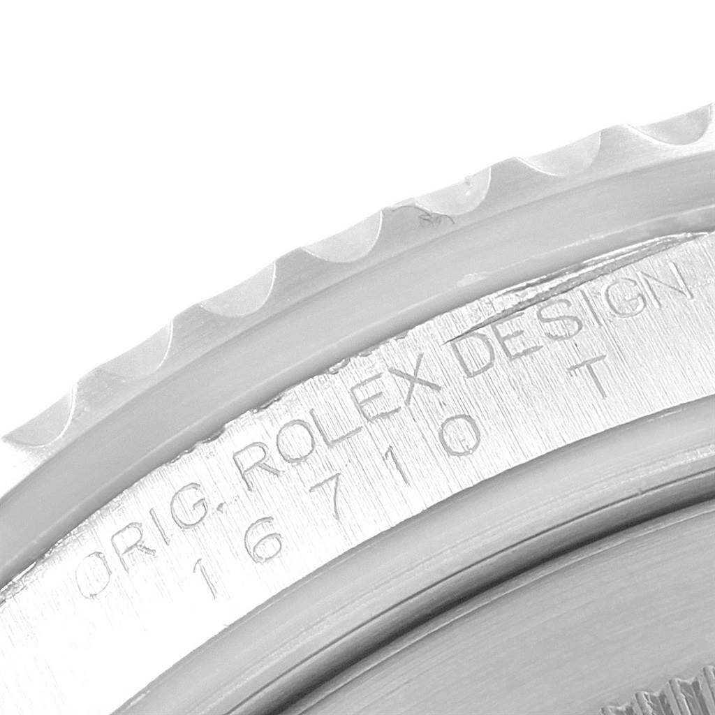 This is a close-up shot of the bezel and case edge of a Rolex GMT-Master 20121 Men's Stainless Steel Black Dial 20121 Men's Stainless Steel Black Dial watch, showing its model number and "ORIG. ROLEX DESIGN" inscription.