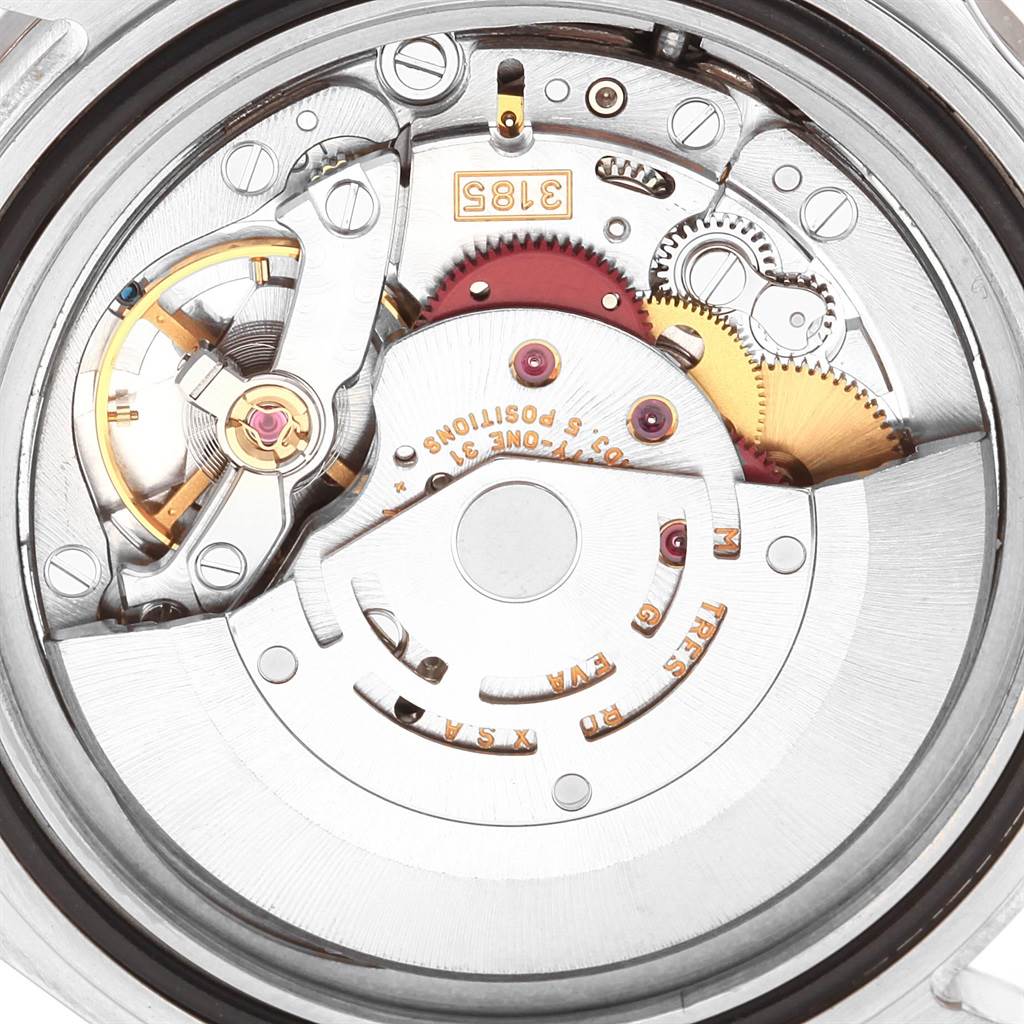 The image shows the intricate internal mechanics of the Rolex GMT-Master 20121 Men's Stainless Steel Black Dial 20121 Men's Stainless Steel Black Dial watch from a close-up, top-down angle.