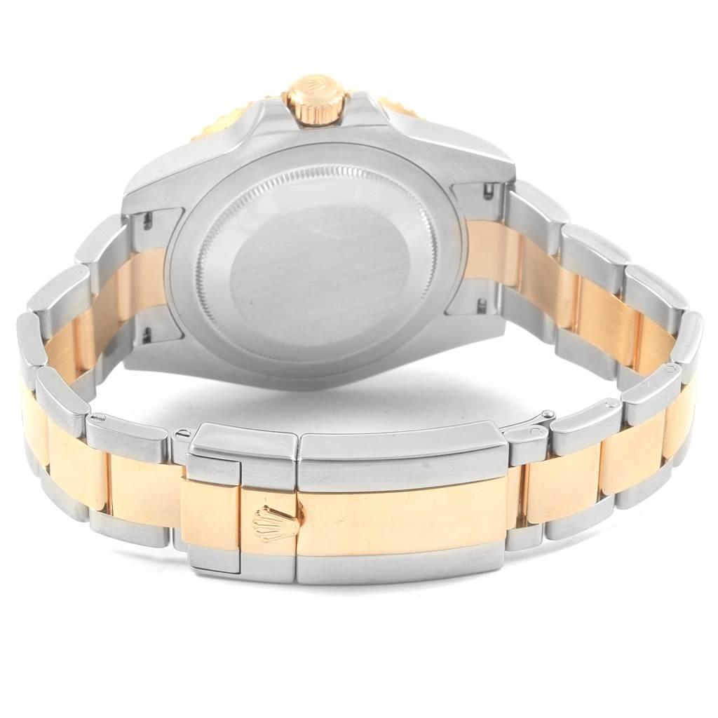 The image shows a rear view of a Rolex GMT-Master 116713 Men's Stainless Steel Black Dial 116713 Men's Stainless Steel Black Dial, highlighting its case back and two-tone metal bracelet.