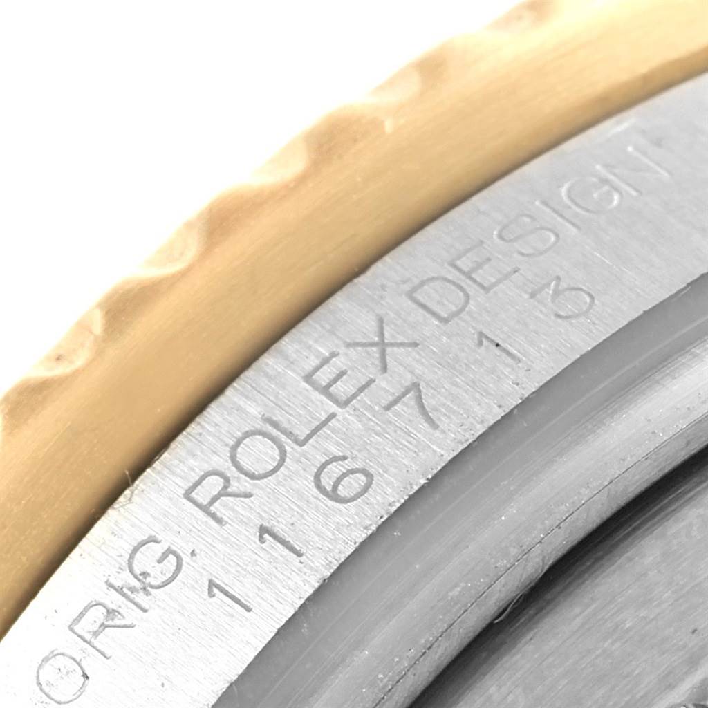 The image shows a close-up of the case side and bezel of a Rolex GMT-Master 116713 Men's Stainless Steel Black Dial 116713 Men's Stainless Steel Black Dial, highlighting the engraved model and design details.