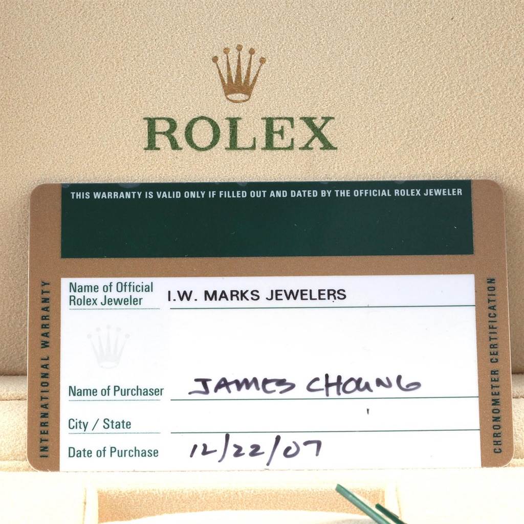 The image shows the warranty card and box of a Rolex GMT-Master 116713 Men's Stainless Steel Black Dial 116713 Men's Stainless Steel Black Dial watch, including the retailer's information and date of purchase.