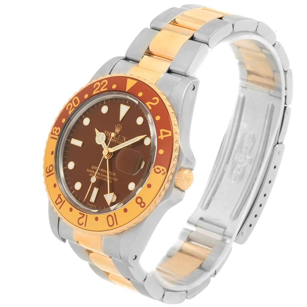 The Rolex GMT-Master 16753 Men's Stainless Steel Brown Dial 16753 Men's Stainless Steel Brown Dial watch is shown at a three-quarter angle, displaying its face, bezel, crown, and bracelet.