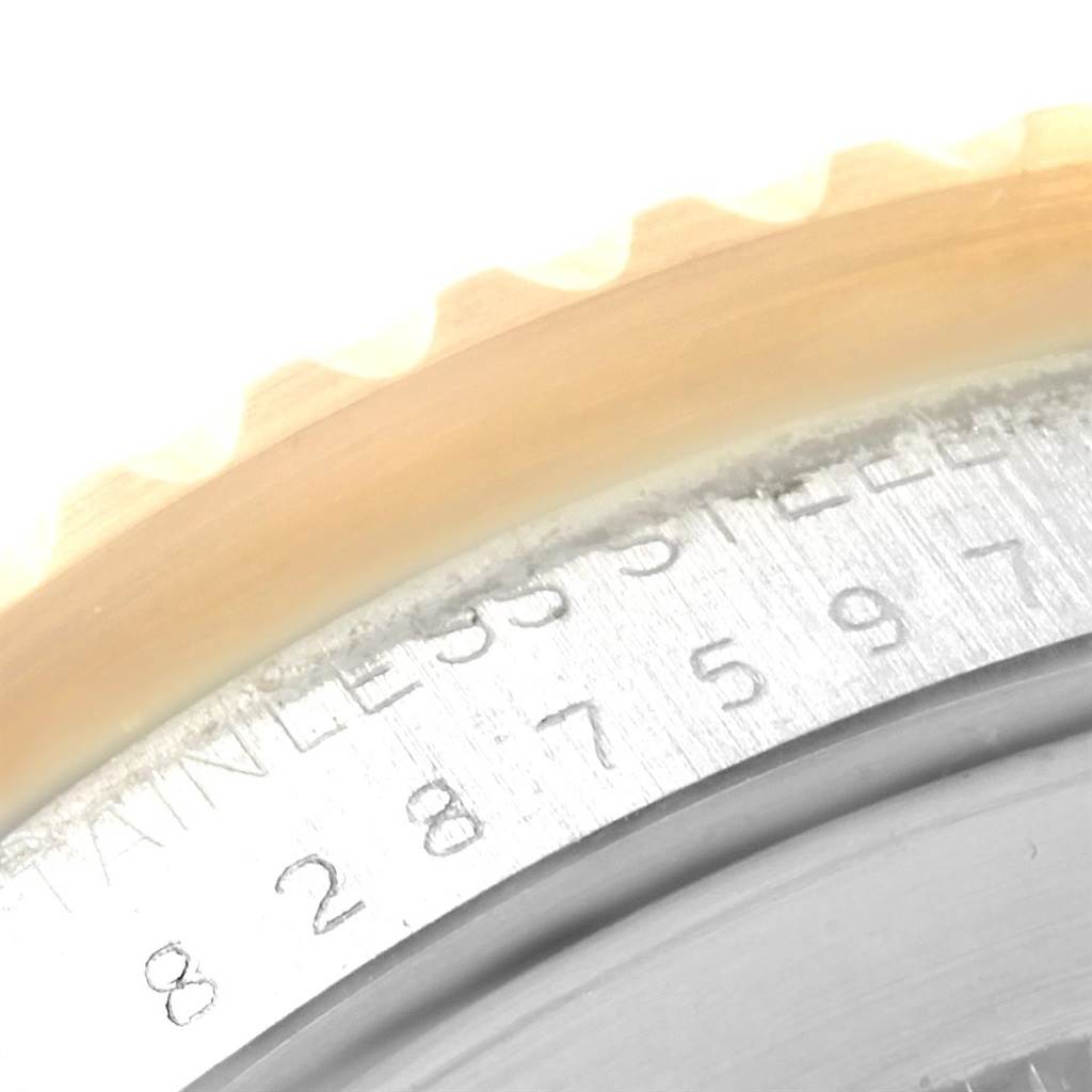 This close-up image shows the casing edge and serial number engraving on a Rolex GMT-Master 16753 Men's Stainless Steel Brown Dial 16753 Men's Stainless Steel Brown Dial watch.