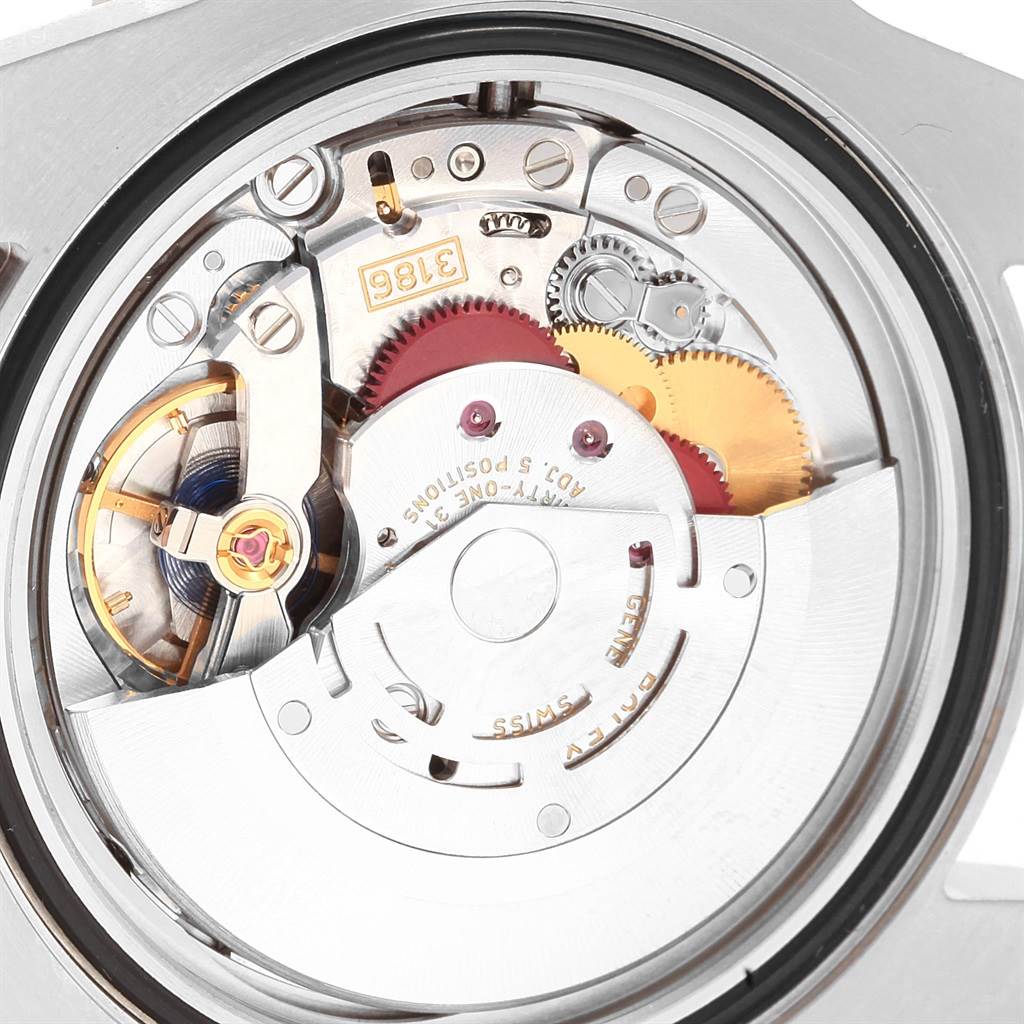 This is a close-up view of the movement of a Rolex GMT-Master 116710 Men's Stainless Steel Black Dial 116710 Men's Stainless Steel Black Dial watch, showing the intricate internal gears and components.