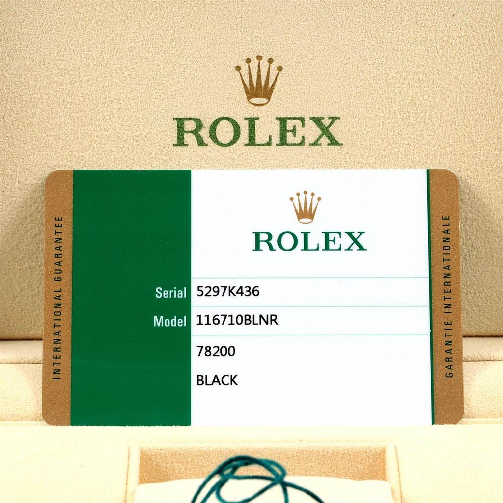 The image shows the warranty card for the Rolex GMT-Master 116710 Men's Stainless Steel Black Dial 116710 Men's Stainless Steel Black Dial model 116710BLNR, along with a small portion of the watch packaging.