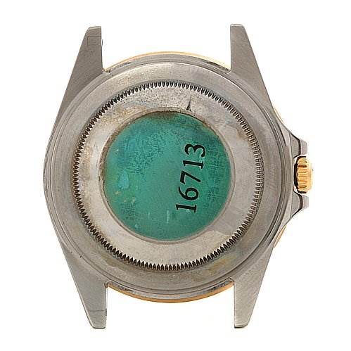 This is the back view of a Rolex GMT-Master 16713 Men's Stainless Steel Black Dial 16713 Men's Stainless Steel Black Dial watch case, displaying the serial number.