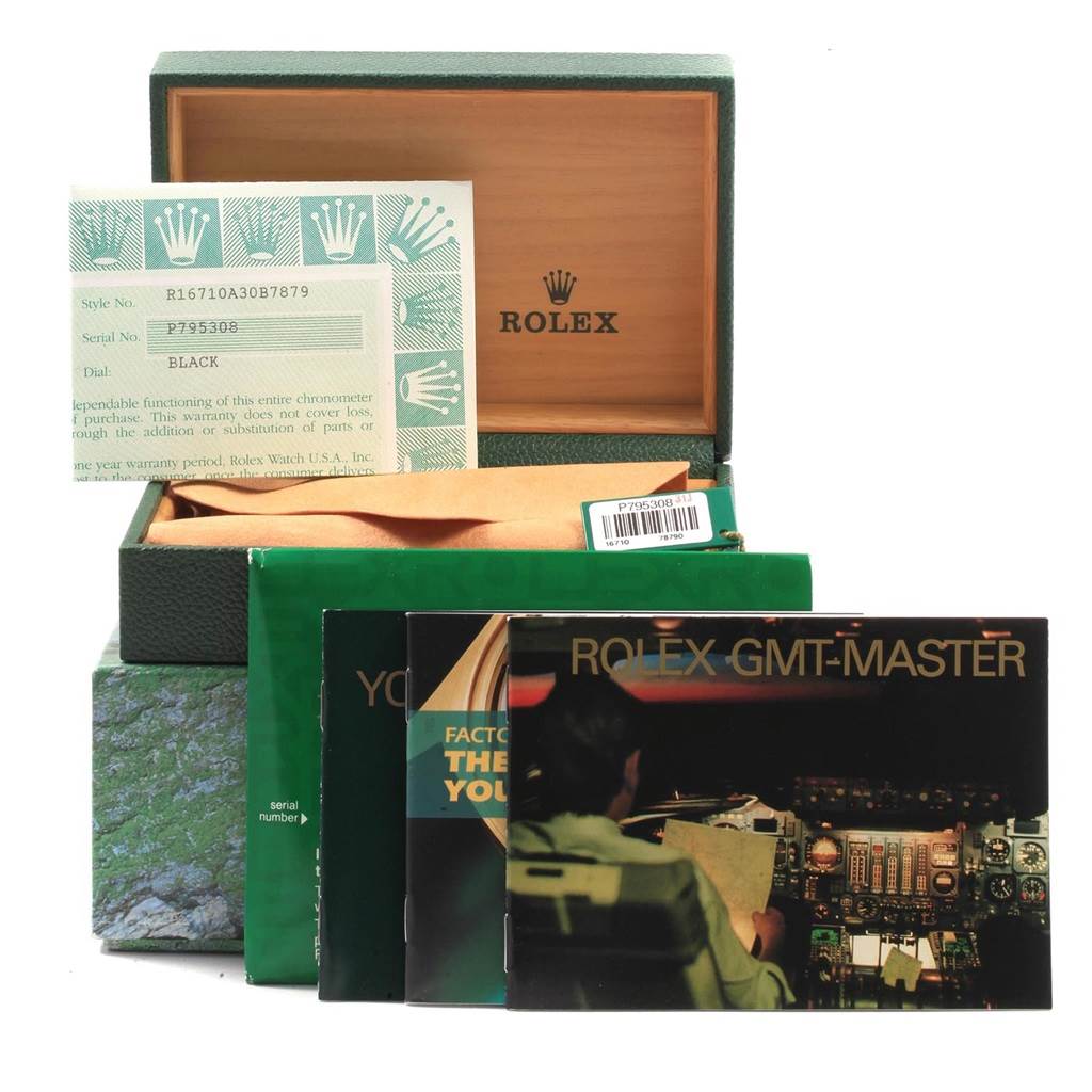 The image shows an open Rolex box with Rolex GMT-Master 16710 Men's Stainless Steel Black Dial 16710 Men's Stainless Steel Black Dial booklets, a certificate, and warranty card.
