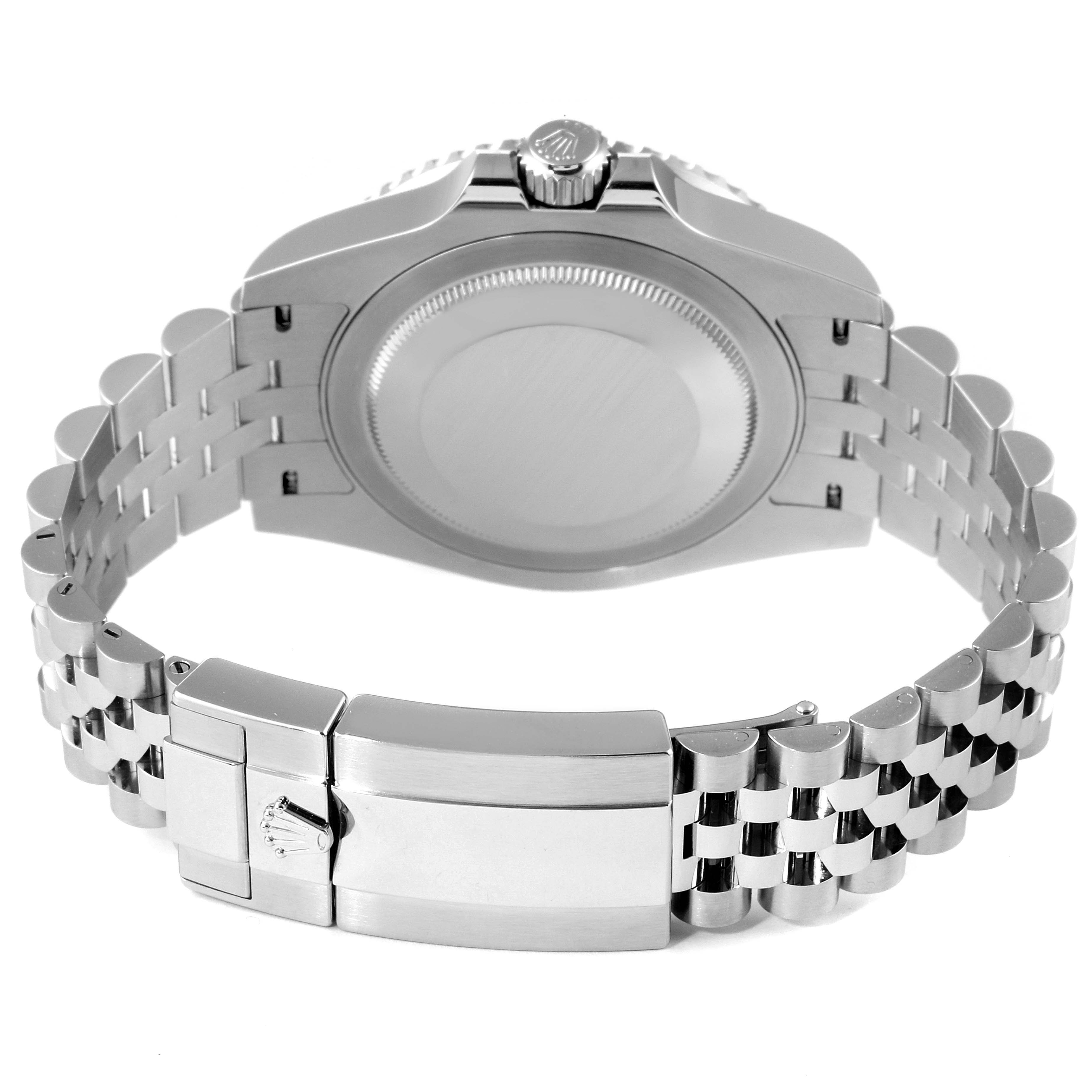 The image shows the back case, crown, and the jubilee bracelet, including the clasp, of a Rolex GMT-Master 126710 Men's Stainless Steel Black Dial 126710 Men's Stainless Steel Black Dial watch from a rear angle.