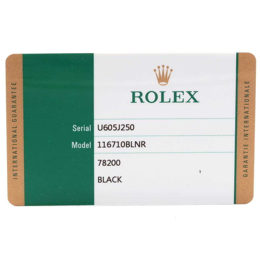 This is a close-up of a Rolex International Guarantee card for a GMT-Master model with details including serial and model numbers.
