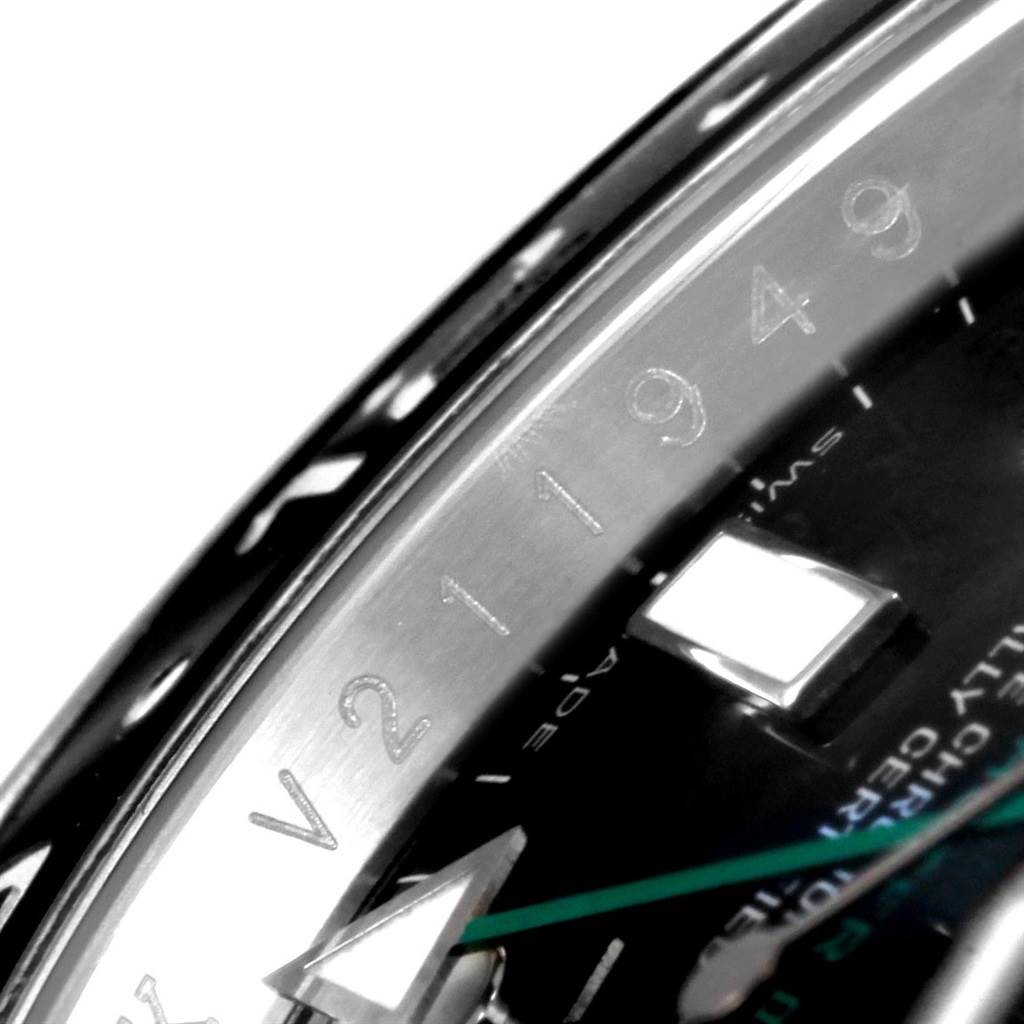 The image shows a close-up angle of the Rolex GMT-Master 116710 Men's Stainless Steel Black Dial 116710 Men's Stainless Steel Black Dial watch, focusing on the bezel, dial, and part of the hands.