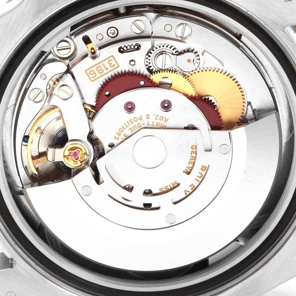 This image shows the intricate internal movement parts of a Rolex GMT-Master 116719 Men's White Gold Black Dial 116719 Men's White Gold Black Dial watch.