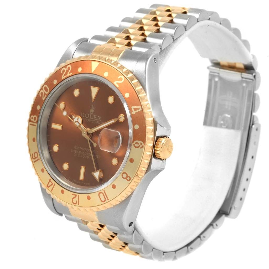 This image shows a Rolex GMT-Master 16713 Men's Stainless Steel Brown Dial 16713 Men's Stainless Steel Brown Dial watch angled from the front-right, highlighting the bezel, dial, and bracelet.