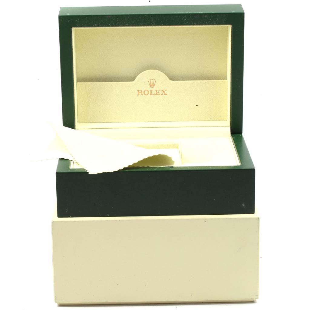 The image shows an open Rolex box for a GMT-Master model, with the lid raised and a cleaning cloth partially inside.
