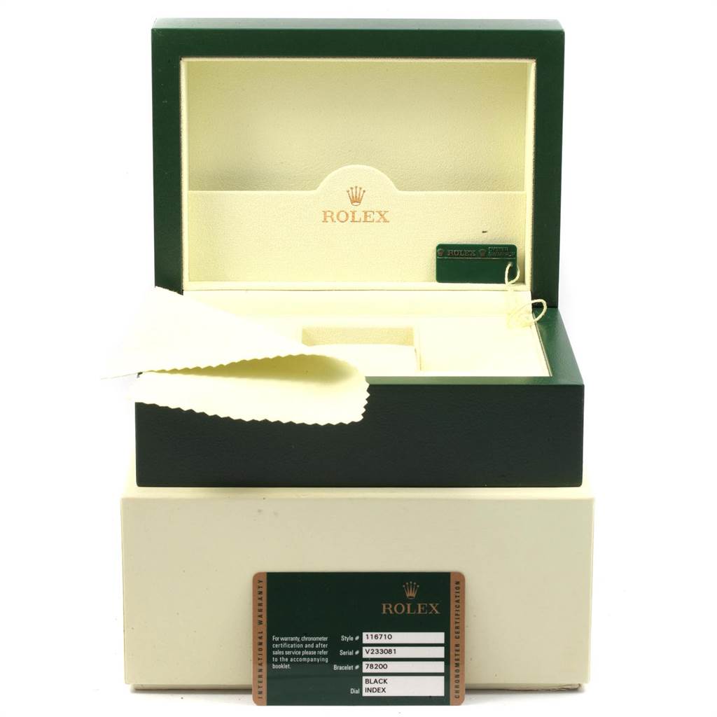 The image shows an open box for a Rolex GMT-Master 116710 Men's Stainless Steel Black Dial 116710 Men's Stainless Steel Black Dial watch, including a polishing cloth, serial tag, and a warranty card.