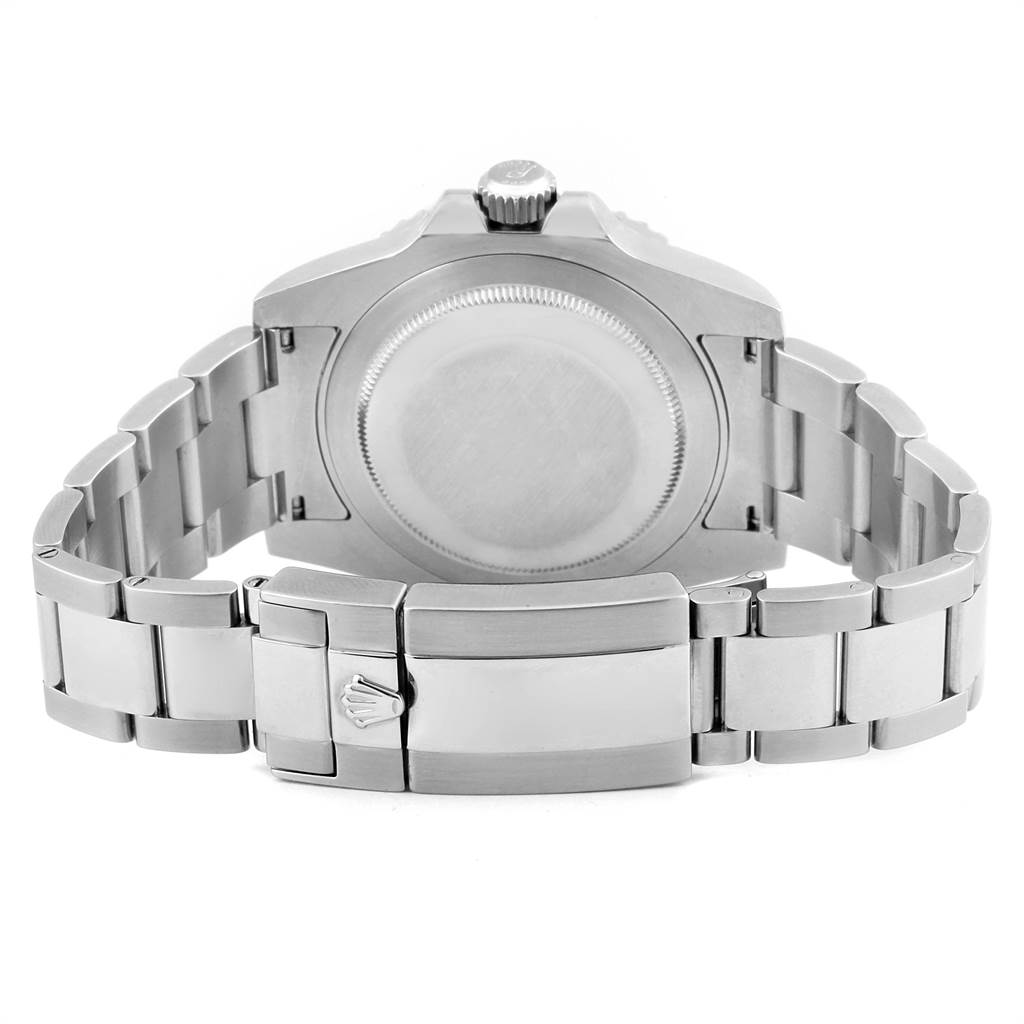 The rear angle of the Rolex GMT-Master 116710 Men
s Stainless Steel Black Dial 116710 Men
s Stainless Steel Black Dial displays the case back, crown, and clasp of the metal bracelet.