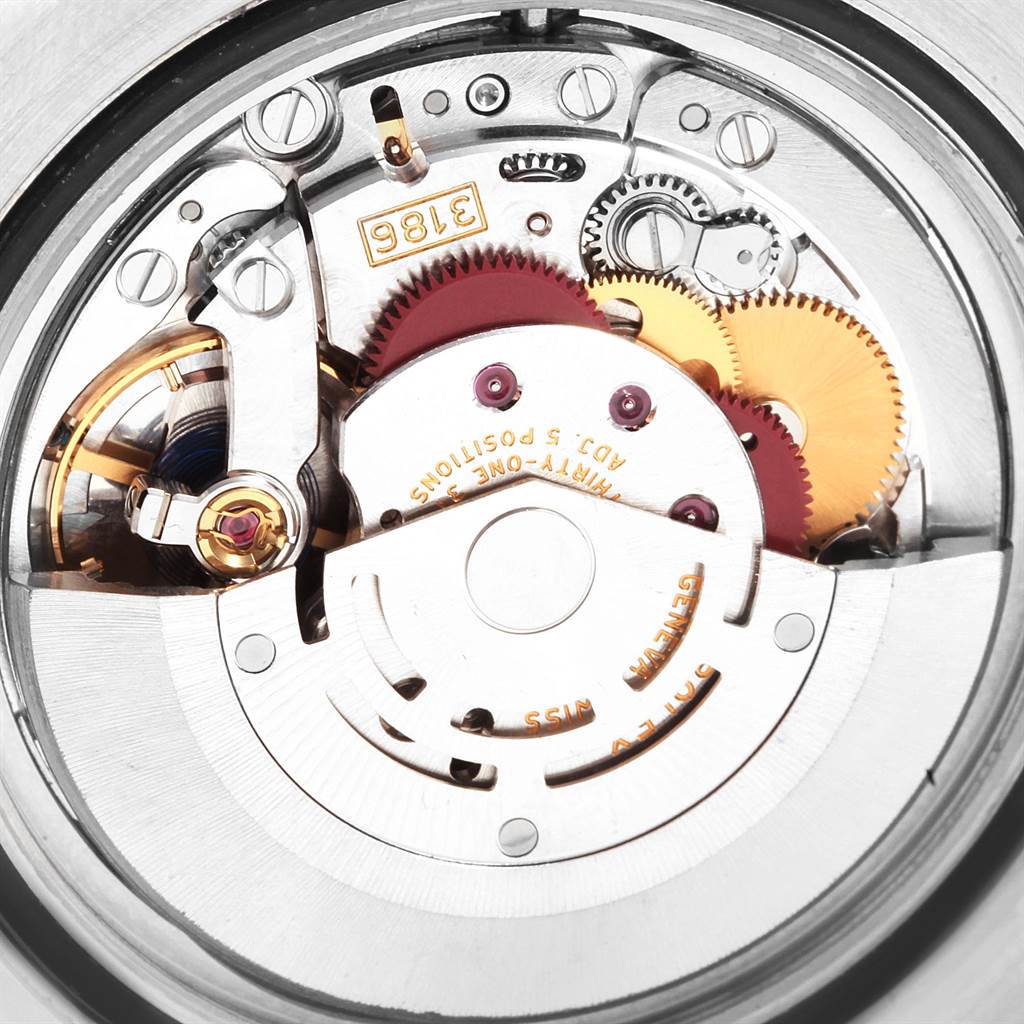 This image shows a close-up view of the movement parts of a Rolex GMT-Master 116710 Men
s Stainless Steel Black Dial 116710 Men
s Stainless Steel Black Dial watch.