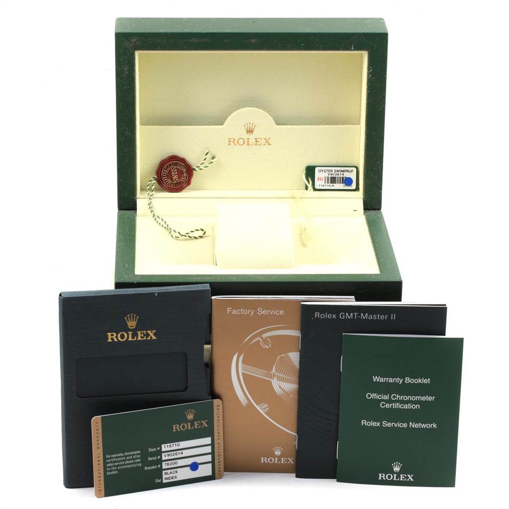 The image shows the packaging and accessories of a Rolex GMT-Master 116710 Men
s Stainless Steel Black Dial 116710 Men
s Stainless Steel Black Dial model, including box, booklets, warranty card, and hang tag.