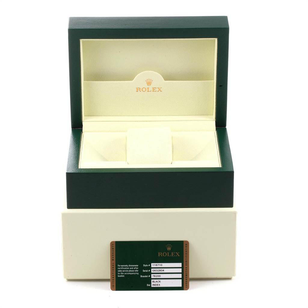 This image shows an open Rolex GMT-Master 116710 Men's Stainless Steel Black Dial 116710 Men's Stainless Steel Black Dial watch box with an accompanying warranty card in the foreground.