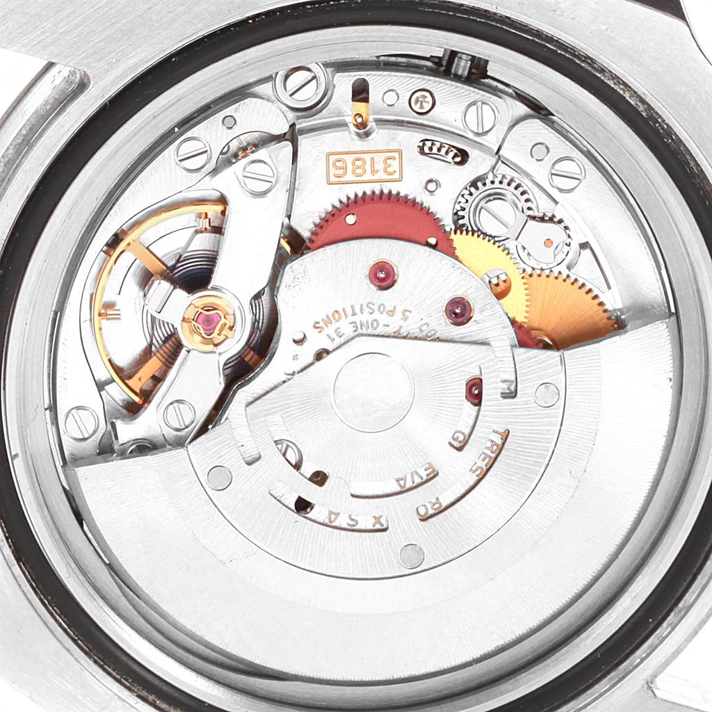 This image shows the inner movement of a Rolex GMT-Master 116710 Men's Stainless Steel Black Dial 116710 Men's Stainless Steel Black Dial watch from a close-up, top-down angle.