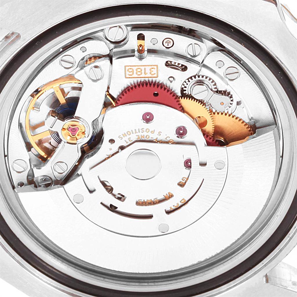 This image shows the movement mechanism of a Rolex GMT-Master 116713 Men's Stainless Steel Black Dial 116713 Men's Stainless Steel Black Dial watch from the back.