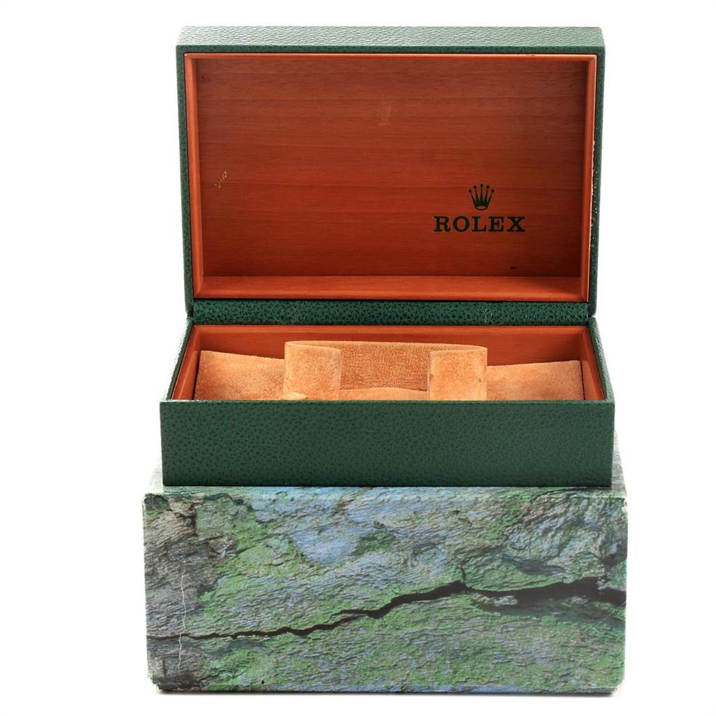 The green and brown box for the Rolex GMT-Master 16710 Men's Stainless Steel Black Dial 16710 Men's Stainless Steel Black Dial watch is shown open, with the interior lining and Rolex logo visible.