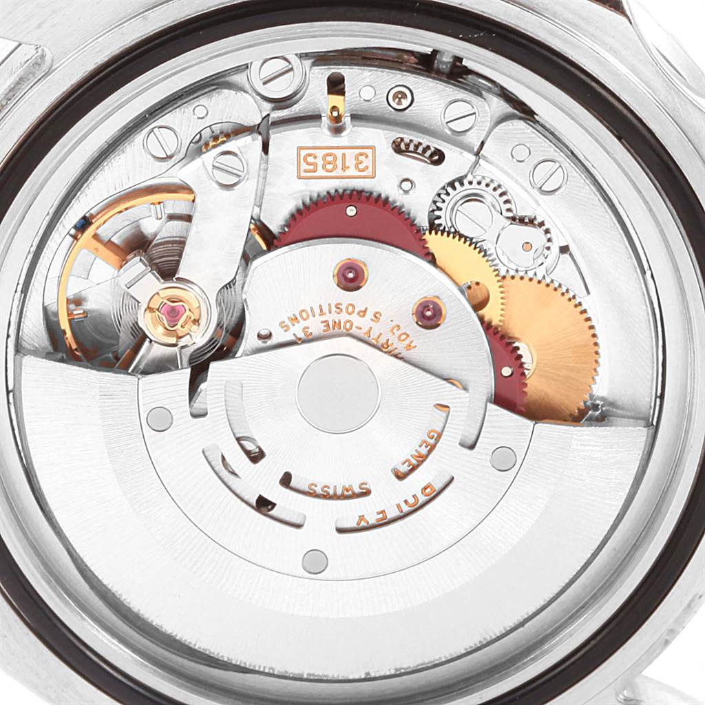 This image shows the intricate internal mechanism of the Rolex GMT-Master 16710 Men
s Stainless Steel Black Dial 16710 Men
s Stainless Steel Black Dial, focusing on the gears and movement parts.