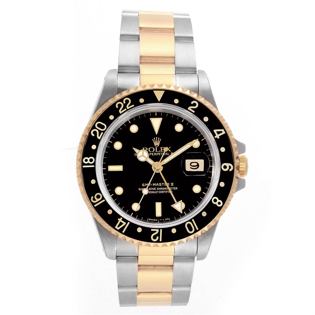 The image shows a Rolex GMT-Master 16713 Men's Stainless Steel Black Dial 16713 Men's Stainless Steel Black Dial model watch from a front angle, featuring a black dial, two-tone bezel, and a two-tone bracelet.