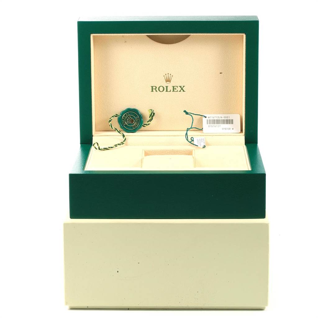 This is a Rolex GMT-Master 116713 Men's Stainless Steel Black Dial 116713 Men's Stainless Steel Black Dial watch box with tags, photographed from the front with the lid open.