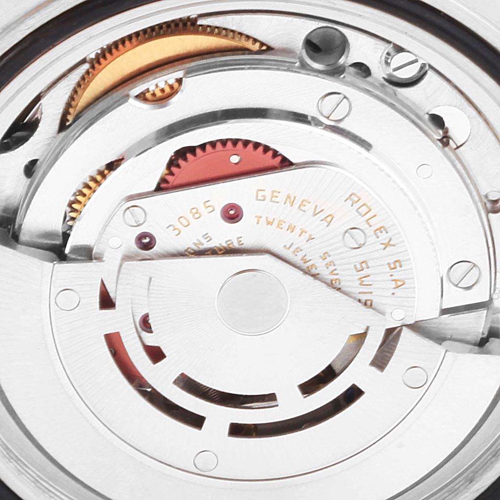 This close-up image shows the inner mechanical movement of the Rolex GMT-Master 16760 Men's Stainless Steel Black Dial 16760 Men's Stainless Steel Black Dial watch.