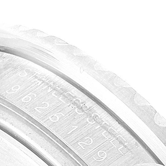 The image shows a close-up angle of the case side and engraved serial number of a Rolex GMT-Master 16760 Men's Stainless Steel Black Dial 16760 Men's Stainless Steel Black Dial watch.