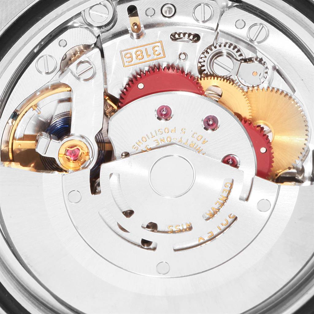 The image shows the internal mechanical movement of a Rolex GMT-Master 116710 Men's Stainless Steel Black Dial 116710 Men's Stainless Steel Black Dial watch, highlighting gears, springs, and cogs.