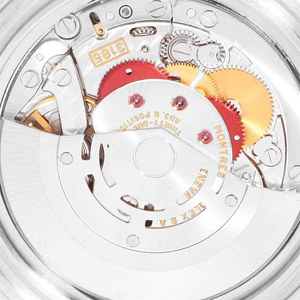 This image shows the intricate internal mechanism of a Rolex GMT-Master 16710 Men's Stainless Steel Black Dial 16710 Men's Stainless Steel Black Dial, highlighting gears and the rotor.