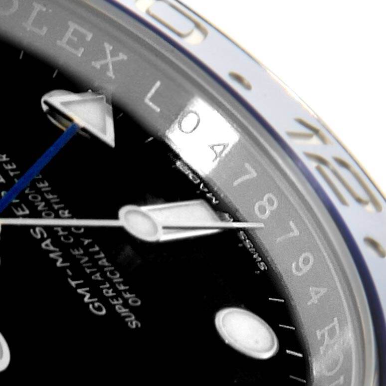 The image shows a close-up angle of the dial and bezel of a Rolex GMT-Master 126710 Men's Stainless Steel Black Dial 126710 Men's Stainless Steel Black Dial watch, highlighting the hour markers and hands.
